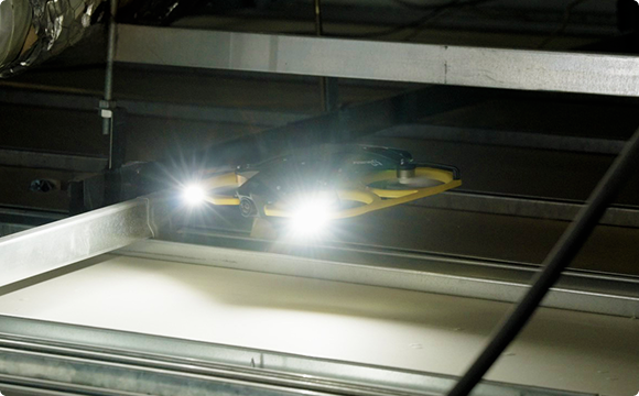 Worker Focuses on the 3D scanner